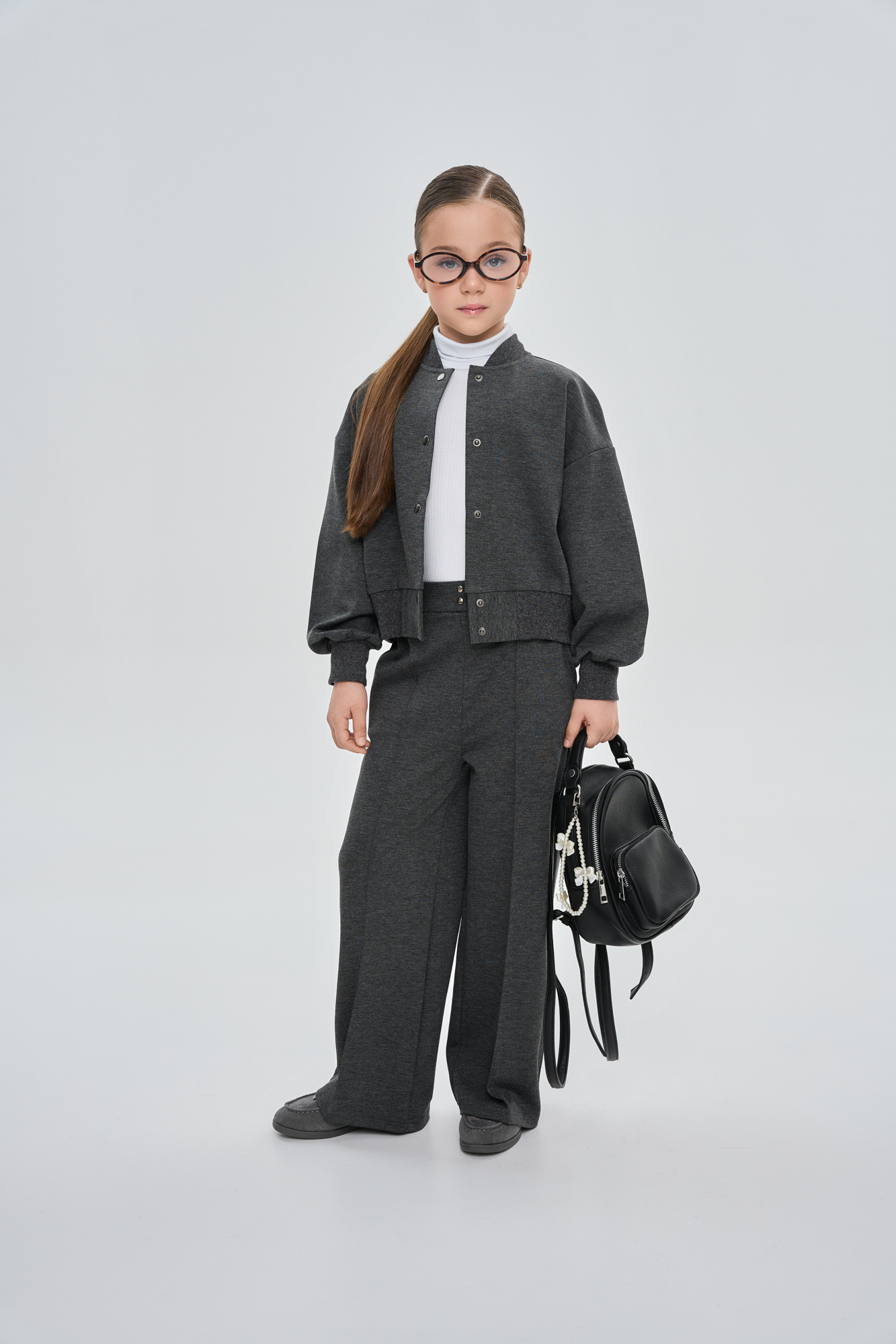 
Брюки палаццо с декоративной стрелкой